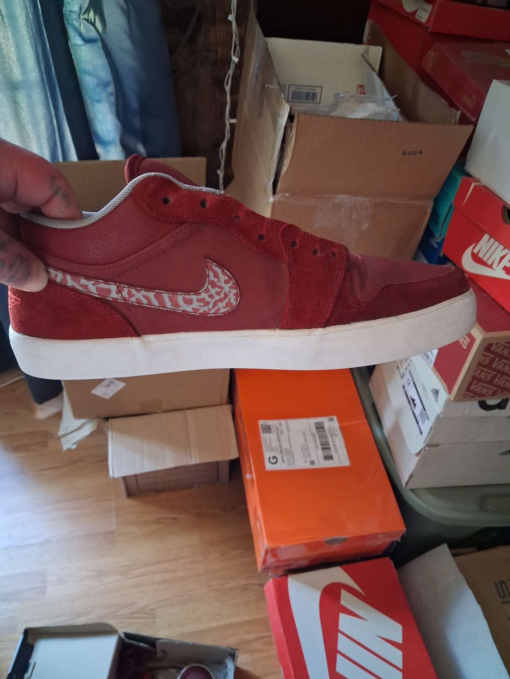 Jordan Men's Red Low-Top Sneaker with Patterned Swoosh